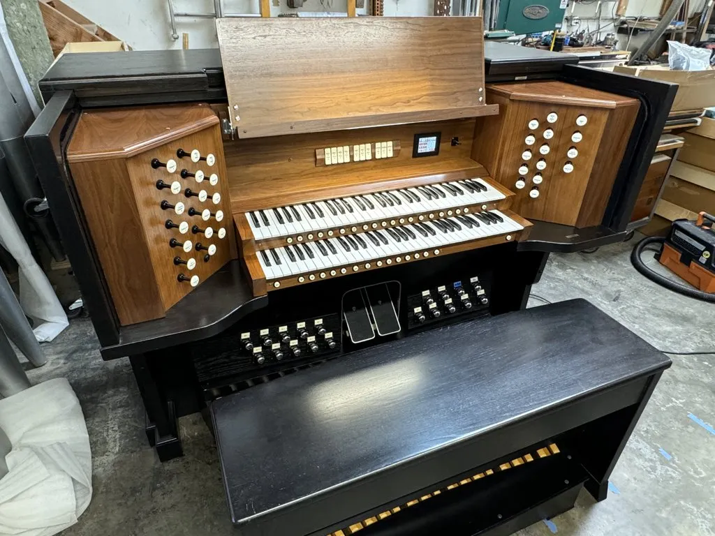 Finished pipe organ console installation